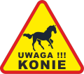 znak drogowy uwaga konie.png